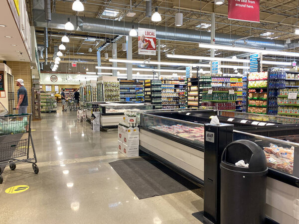 Orlando, FL/USA-5/3/20: An overview of multiple  aisles of a Whole Foods Market grocery store.
