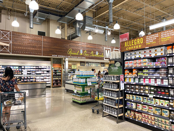 Orlando, FL/USA-5/3/20: An overview of multiple  aisles of a Whole Foods Market grocery store.