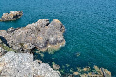 Sudaki kayalar, güzel deniz, Howth, Dublin Körfezi, İrlanda