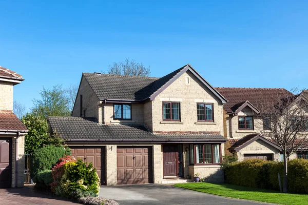 Suburban House with Double Garage  Stock Editorial Photo 