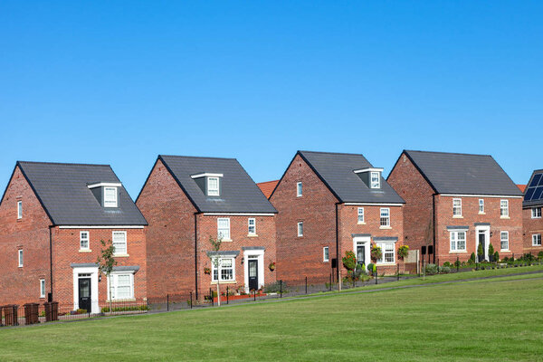 Row of red brick english houses