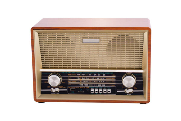 old radio with wood and cloth on white background