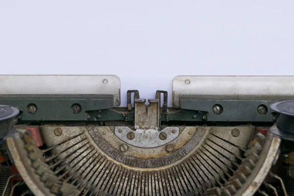 Máquina de escribir y papel blanco vacío —  Fotos de Stock
