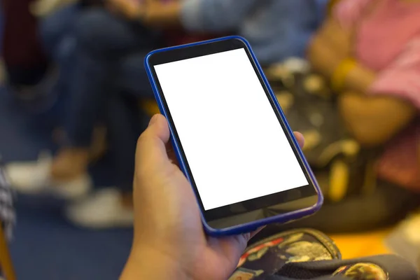 Person hand holding smartphone