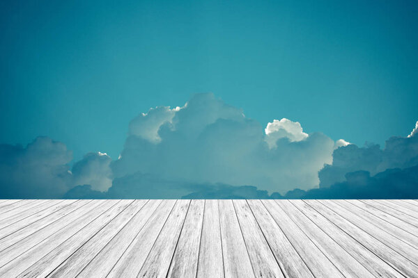 Nature cloudscape with blue sky and white cloud with Wood terrace , process in vintage style