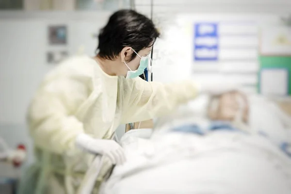Patient relative taking care of the elder patient — Stock Photo, Image