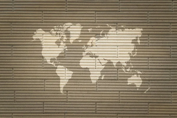 Superficie de textura de pared con mapa mundial —  Fotos de Stock