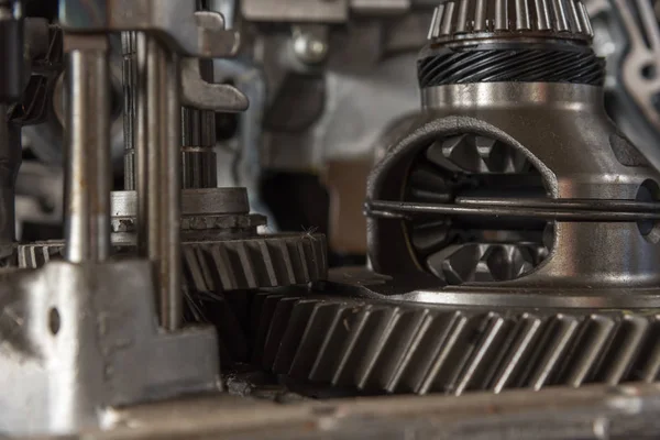 Disassembled car dirty engine and gear at garage — Stock Photo, Image