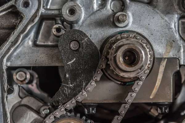 Disassembled car dirty engine and gear at garage — Stock Photo, Image