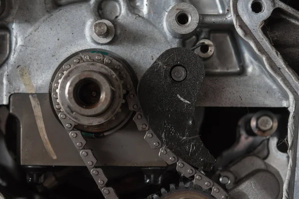 Disassembled car dirty engine and gear at garage — Stock Photo, Image