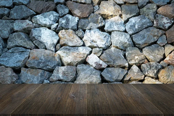 Stone wall texture with wood terrace with world map — Stock Photo, Image