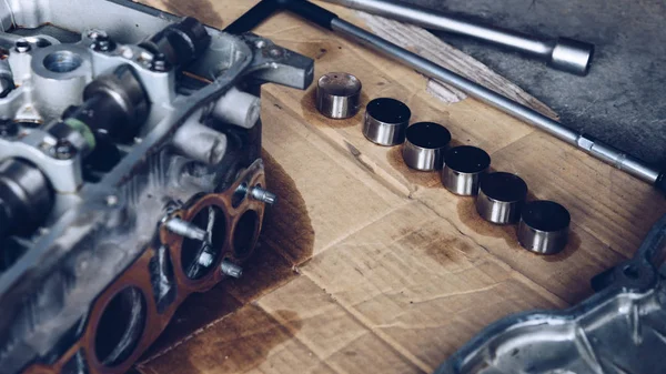 Disassembled car dirty engine cylinder at garage — Stock Photo, Image