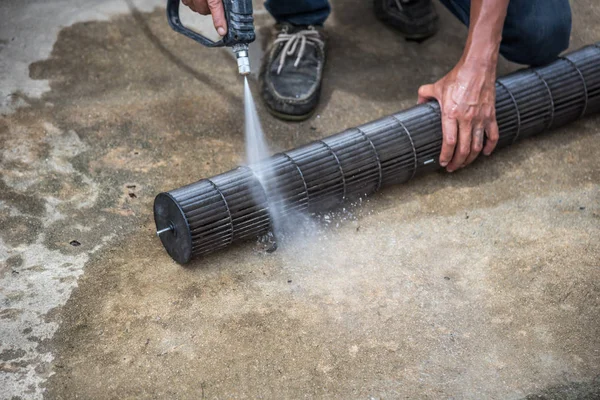 Cleaning air conditioner by water for clean a dust — Stock Photo, Image