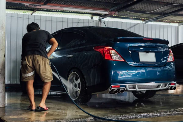 Cleaning the car (Car detailing) at car care shop