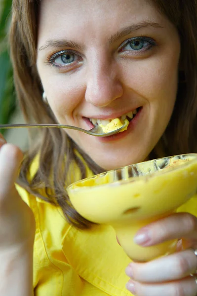 woman eats dessert