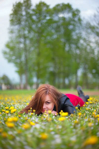 Girl among the flowers — Stock Photo, Image