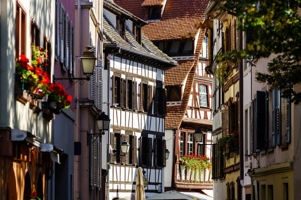 Sunny day on the street of old center, Strasbourg, touristic concept