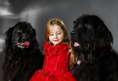 Beauty and the Beast. Girl with big black water-dog. clipart