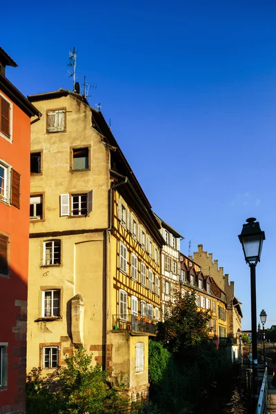 Classic colorized timber-framed alsacien houses in the street of — Stock Photo, Image