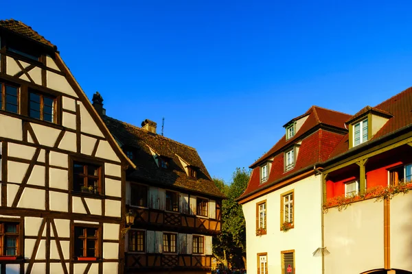 Classic colorized timber-framed alsacien houses in the street of — Stock Photo, Image