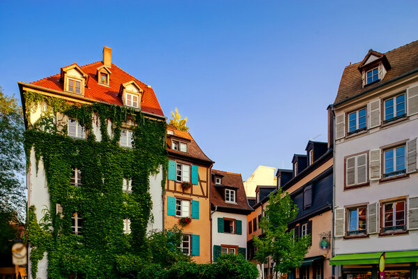 Classic colorized timber-framed alsacien houses in the street of Little France, Strasbourg, touristic concept