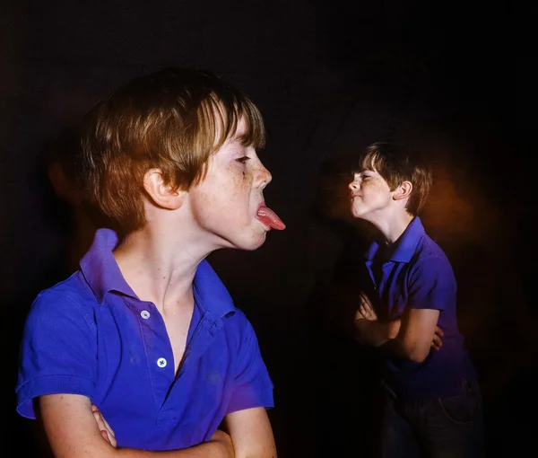 Dubbel-blootgesteld portret van roodharige emotionele sproeterig jongen — Stockfoto