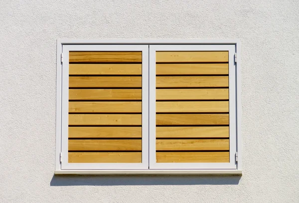 Window with shutters closeup view, sunny day on sea resort — Stock Photo, Image