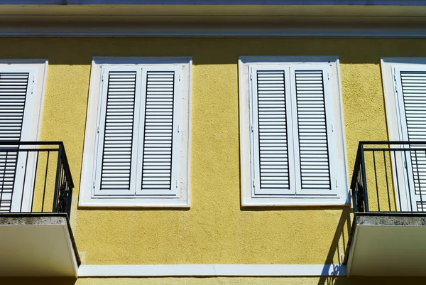 Window with shutters closeup view, sunny day on sea resort — Stock Photo, Image