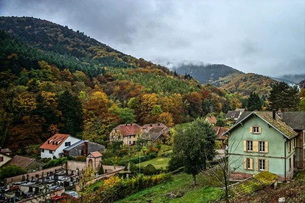 Little village in mountains autumnal view, Murbach — Stock Photo, Image