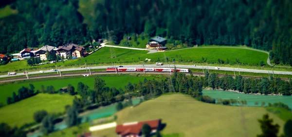 Miniature aerial view of train on railway — Stock Photo, Image