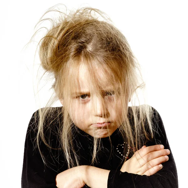Disheveled preschooler girl with stupid face — Stock Photo, Image