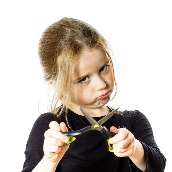 Cute little girl with scissors. Self hairdresser — Stock Photo, Image