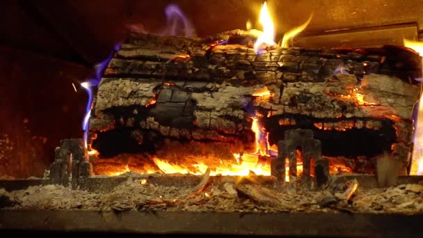 Flaming wood in fireplace closeup view, house and comfort. Slow motion. — Stock Video