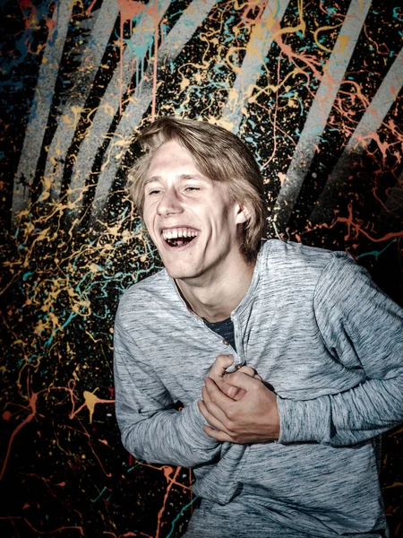 Young attractive guy posing in studio — Stock Photo, Image