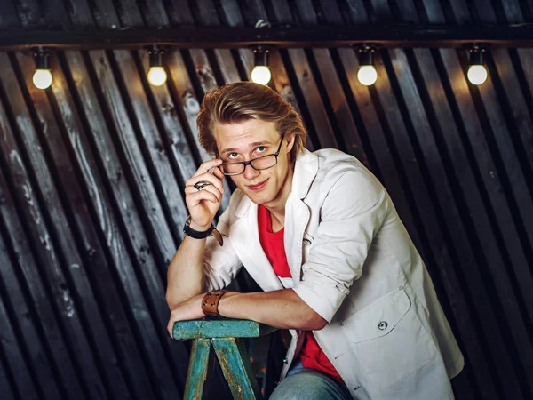 Young attractive guy posing in studio — Stock Photo, Image