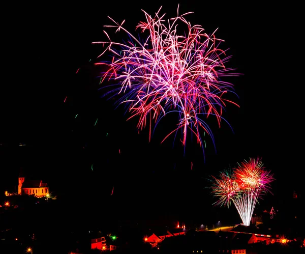 Long Exposure of Multicolored Fireworks Against a Black Sky — Stock Photo, Image