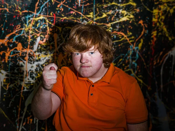 Red-haired funny boy showing fig sign — Stock Photo, Image