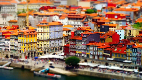 Colorful miniature tilt-shift view of old city center, Porto, Po