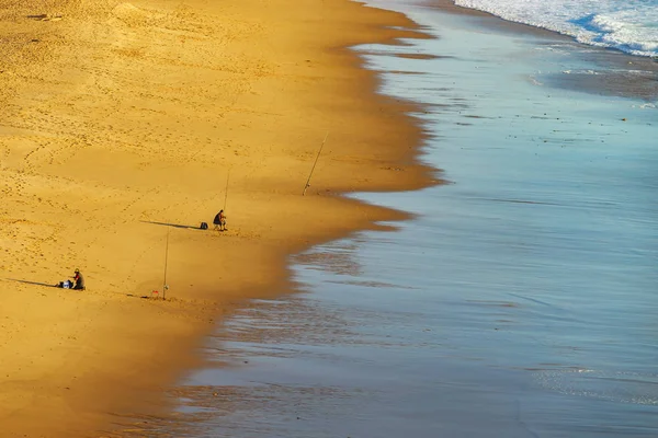 Vivid yellow sand and rocks on coastline, Portugal — Stock Photo, Image