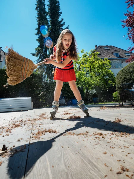 Schoolgirl Poses Broom Yard While Rollerblading Housekeeper Sweeping Garden Automation — Stock Photo, Image