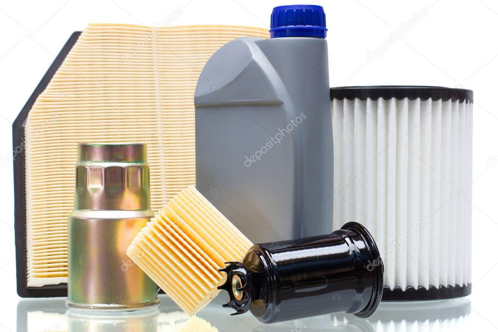 various automotive filters and a liter bottle of motor oil