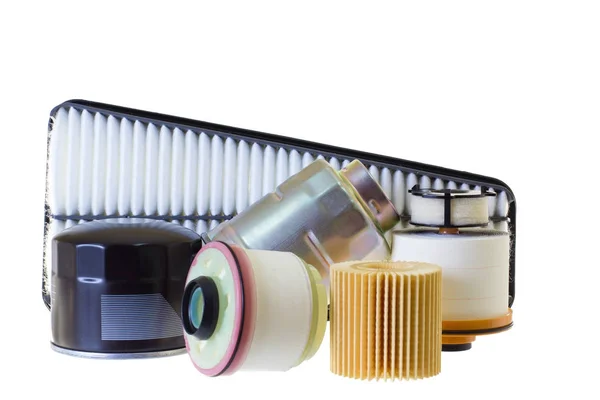 Een samenstelling van brandstof filters voor een dieselmotor op een grijze rug — Stockfoto