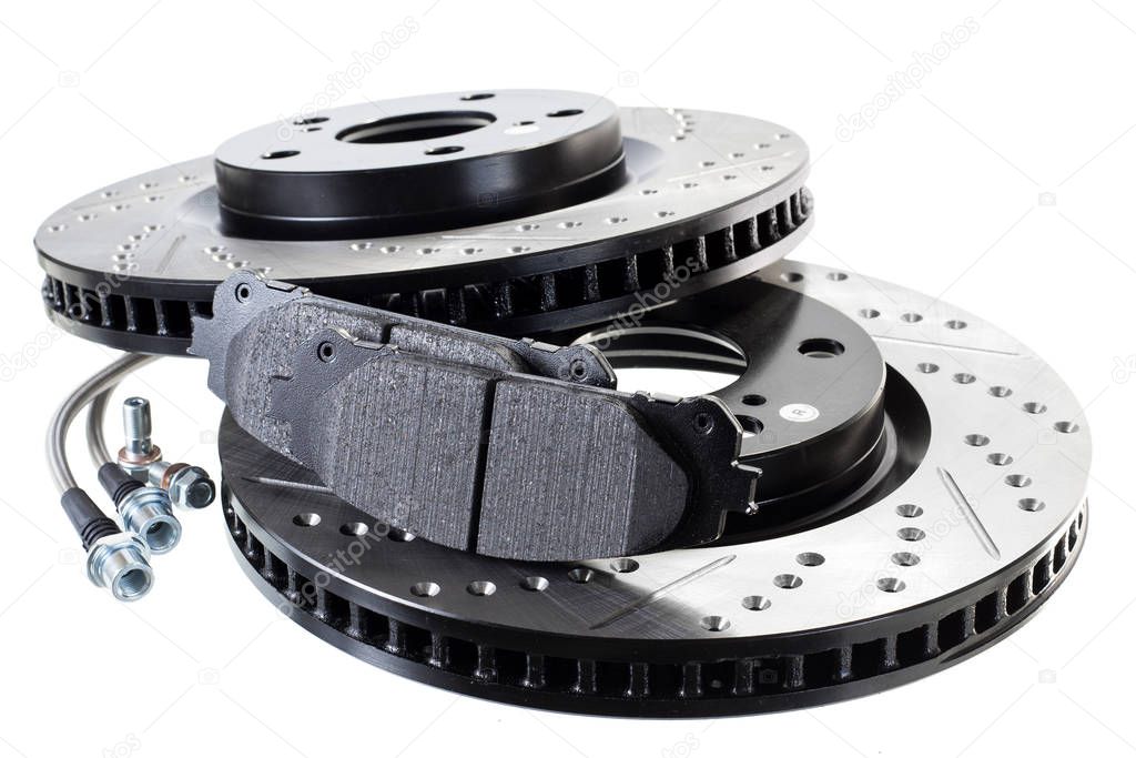 brake disc, pad and reinforced brake hose on a white background