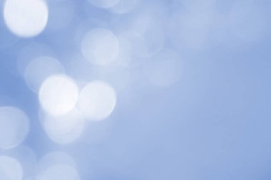 Soyut mavi bokeh arkaplanı. Reklam, gazete ve dergi tasarımı için odaklanmış desen. Evrensel. Yumuşak, mevsim, doku, renk, kış, mavi ışıklar. Boşluğu kopyala