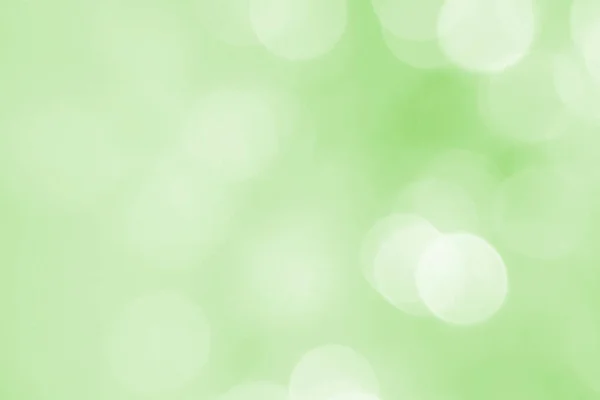 Güzel bir bahar, yaz ve şenlikli bir arka plan. Güneş ışığı, afiş, parlak ve bokeh yakın plan. Yeşil doku. Çevresel koruma teması, sağlık. Yeni reklamlar için pankart.