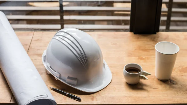 Architectural project, blueprints and coffee cup — Stock Photo, Image