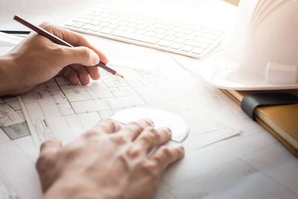 Top view of architect drawing on architectural project, Projectin
