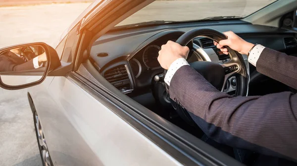 Portrait of a young handsome businessman driving a luxury sports — Stock Photo, Image