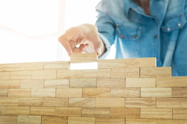 Hand of engineer playing a blocks — Stock Photo, Image