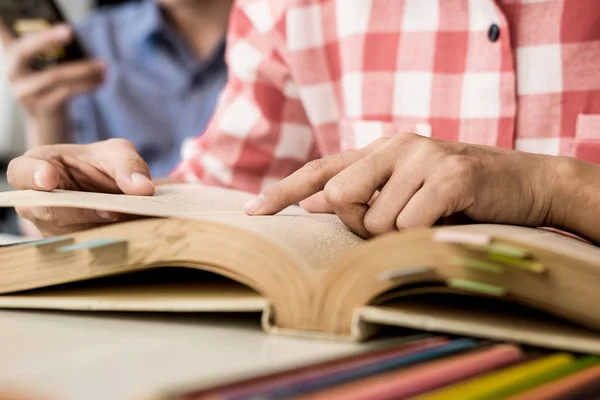 Young woman and man studying — Stock Photo, Image